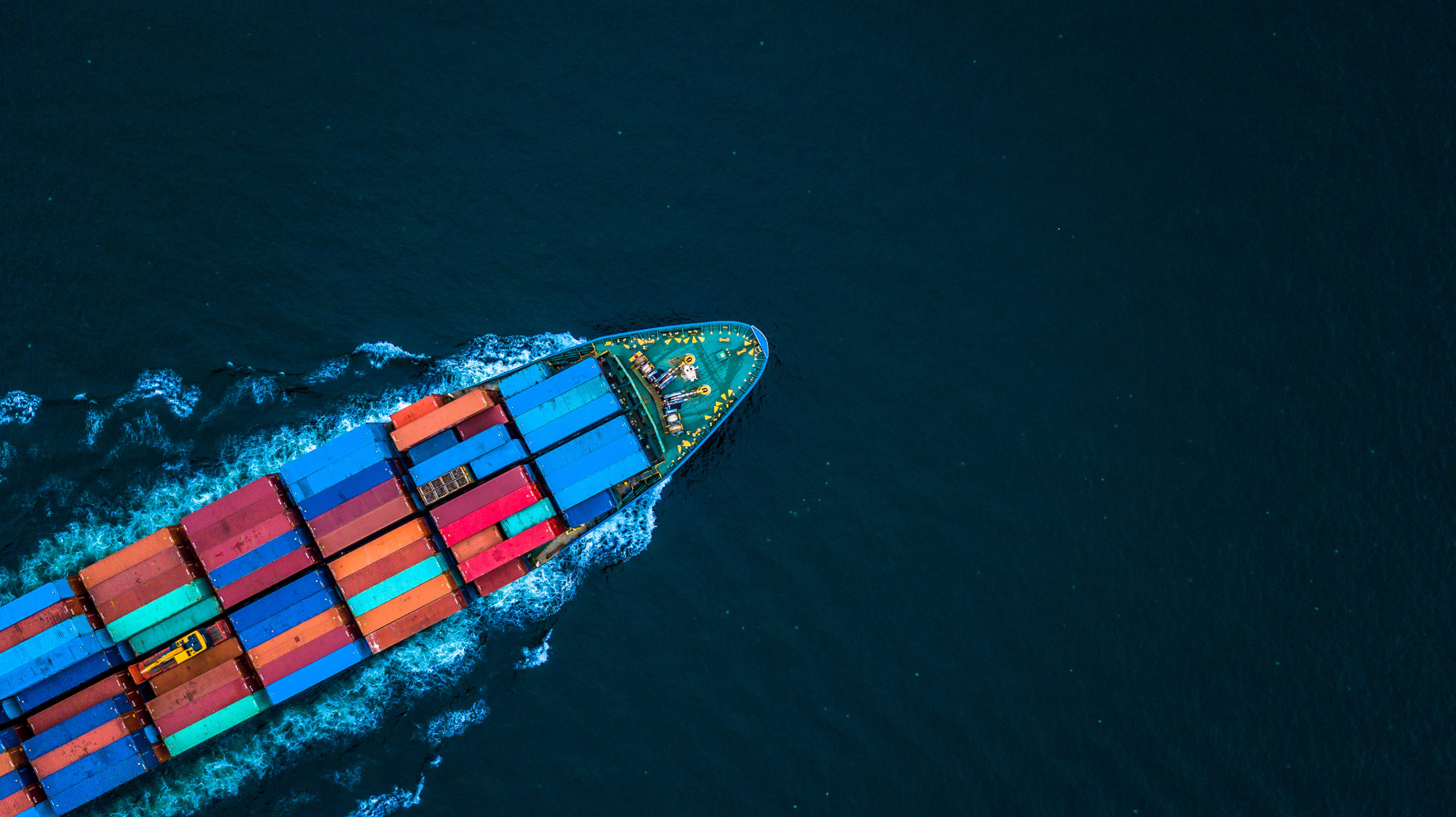 Aerial view from drone, container ship or cargo ship in import export and business logistic.